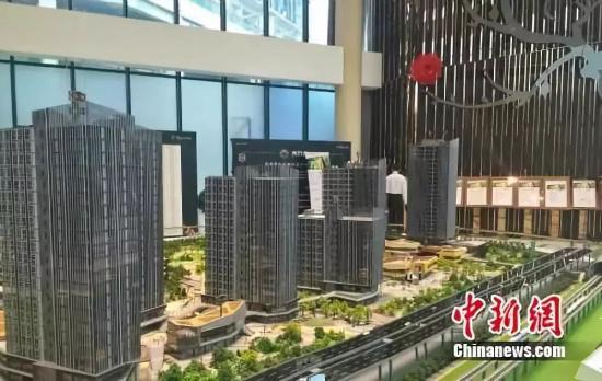 北京房山区某商改住楼盘销售中心。<a target='_blank' data-cke-saved-href='http://www.chinanews.com/' href='http://www.chinanews.com/' >中新网</a> 种卿摄